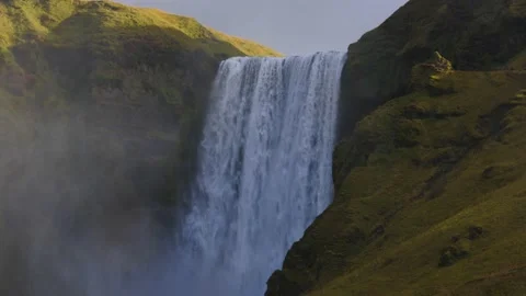 The large Skogafoss waterfall at sunset with a viewpoint at the top. Stock Footage 228264603