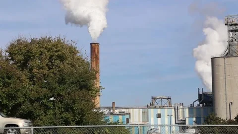 Large Smoke stacks emitting environmental waste Video stock 146875870