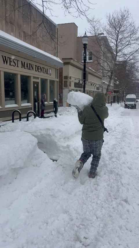Large Snow Ball Knocks Guy Over, New Britain, Connecticut, USA - 26 Jan 2026 Stock Footage 328253324