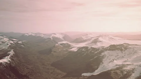 Large snow patch left over on the volcanic rock field of a mountain in summer Stock Footage 229844198