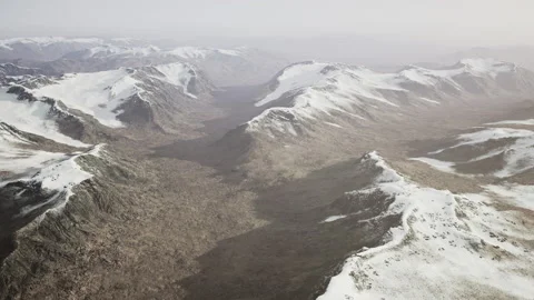 Large snow patch left over on the volcanic rock field of a mountain in summer Video stock 234497119