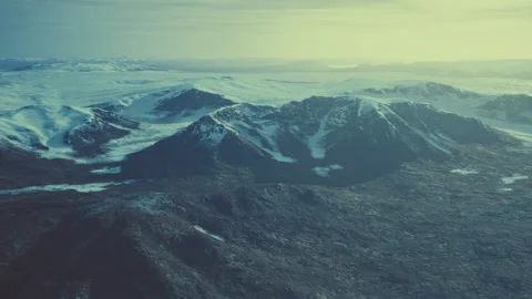 Large snow patch left over on the volcanic rock field of a mountain in summer Stock Footage 235150797