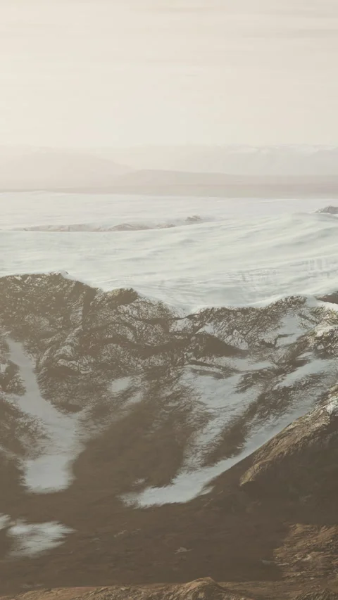 Large snow patch left over on the volcanic rock field of a mountain in summer Stock Footage 283972462