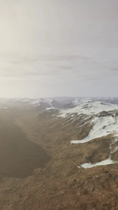 Large snow patch left over on the volcanic rock field of a mountain in summer Stock Footage 309624974