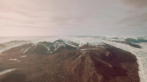 Large snow patch left over on the volcanic rock field of a mountain in summer Ilustración de archivo