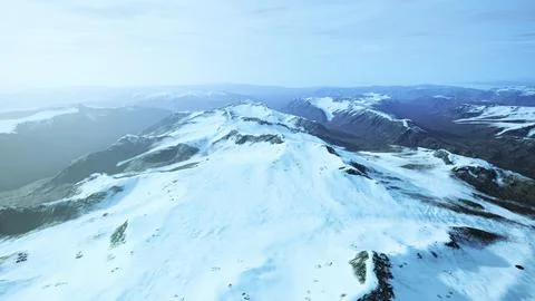 Large snow patch left over on the volcanic rock field of a mountain in summer Illustrazione stock