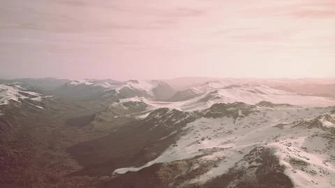 Large snow patch left over on the volcanic rock field of a mountain in summer Ilustración de archivo