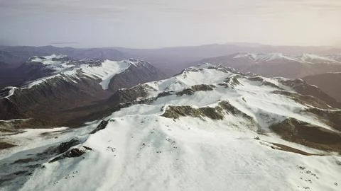Large snow patch left over on the volcanic rock field of a mountain in summer Ilustración de archivo