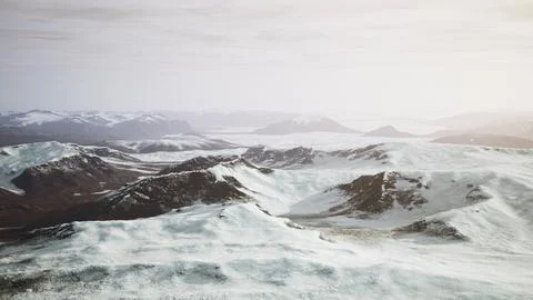 Large snow patch left over on the volcanic rock field of a mountain in summer Ilustración de archivo