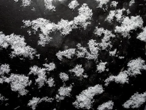 Large snowflakes on a dark background Stock Photos