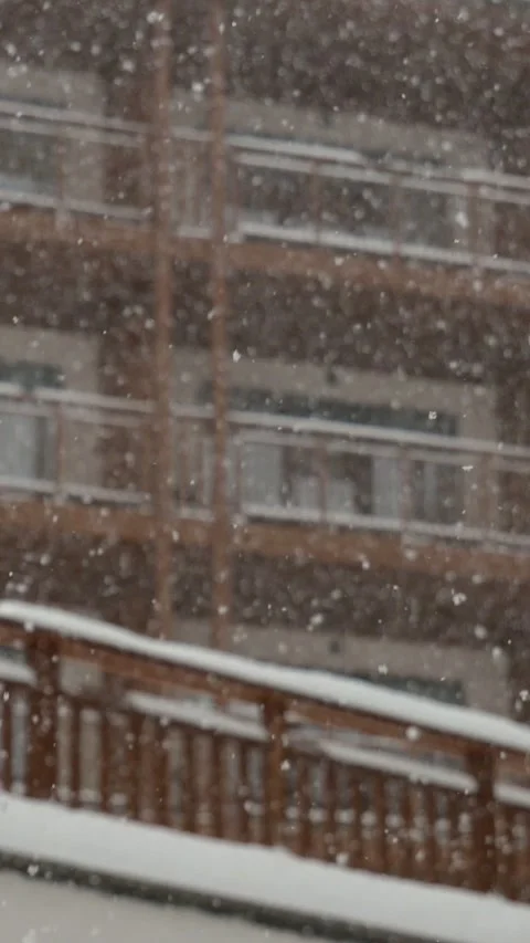 Large snowflakes falling, snowstorm, blizzard, heavy snowfall against Stock Footage 321832857