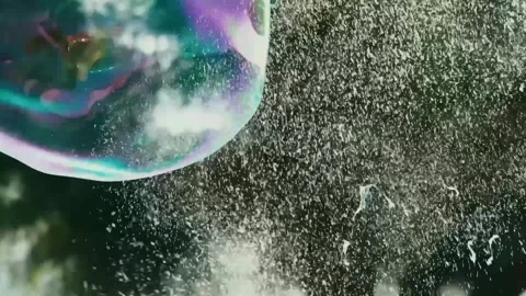 Large soap bubbles in the city of San Sebastian, northern Spain Видео 339080256