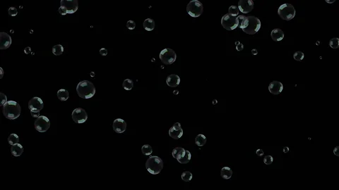 Large soap bubbles shimmering in the light in different colors. Large multi Video stock 135185590