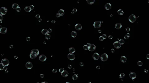 Large soap bubbles slowly rise up on a black background. Stock Footage 135185624