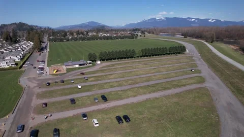 Large soccer field &amp; river flight Stock Footage 238030600
