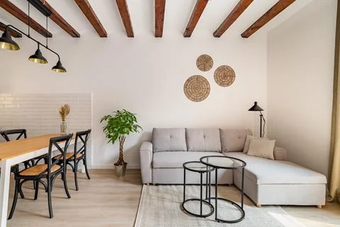 Large sofa and coffee table in living room in studio Фото