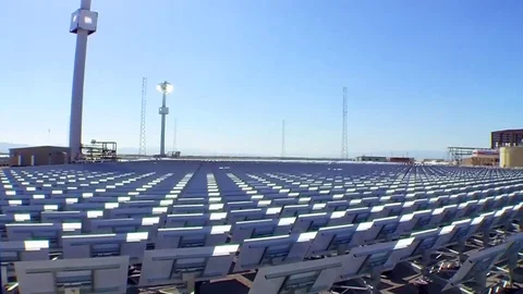 A large solar array in the desert generates clean electricity. Stock Footage 74828663