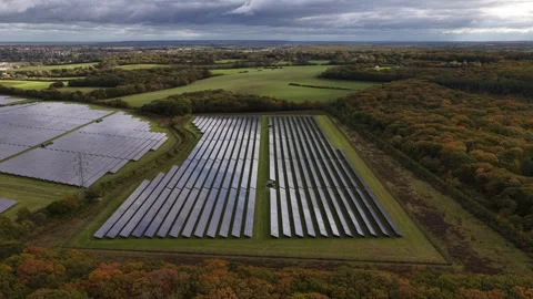 Large solar farm generating renewable energy in countryside 스톡 동영상 346993704
