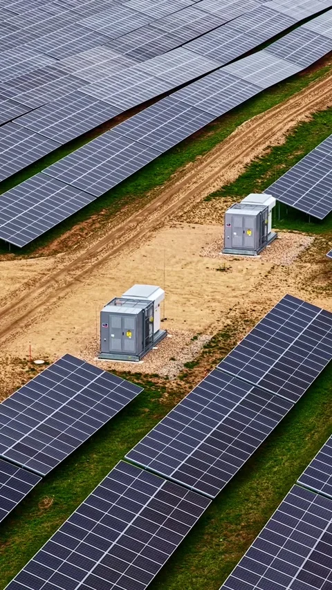 Large solar panel array in a field with dirt roads. Stock Footage 336507496