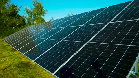 Large solar panel on blue sky background. Production of alternative electricity. Stock Footage 255992731