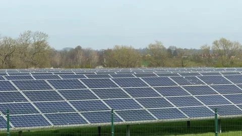 Large solar panel farm array panning Stock Footage 331252424
