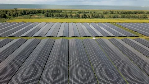Large solar panel park on the Markermeer shore in Almere Buiten, Flevoland Video stock 343621154