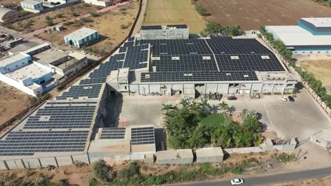 Large solar panels array at industrial roof top..4k video Stock Footage 304104491