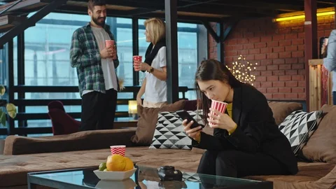 In a large spacious office studio group of office workers have a break time they Stock Footage 122751611