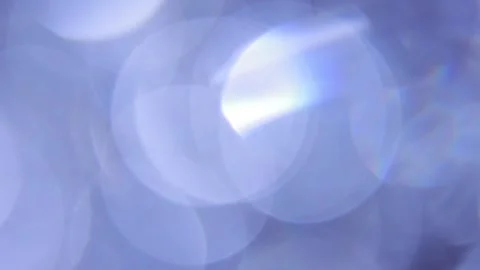 Large, sparkling, full-screen prismatic blue bokeh 動画素材 318919444