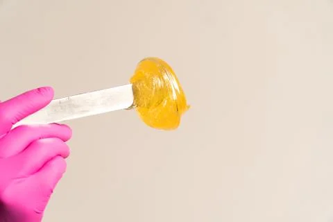 Large spatula sugar paste large for hair removal Stock Photos