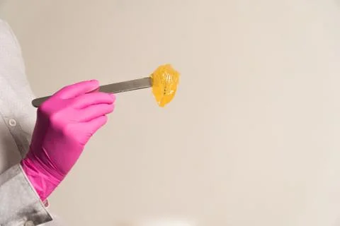 Large spatula sugar paste large for hair removal Stock Photos