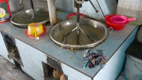 Large specialized mixer used for making traditional Vietnamese sweets Видео 333312067
