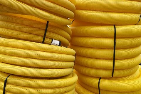 Large spools with perforated corrugation for electrical cables Stock Photos