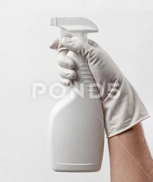 Large spray bottle mockup on a white background PSD Template