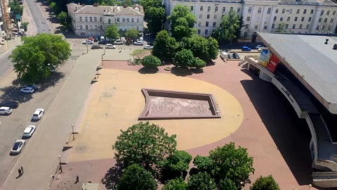 A large square city sunny summer day. City square, non-working fountain Stock Footage 324979334