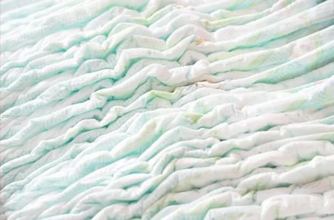 A large stack of baby diapers, close-ups, diaper packaging Stock Photos