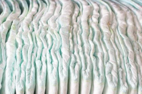 A large stack of baby diapers, close-ups, diaper packaging Stock Photos
