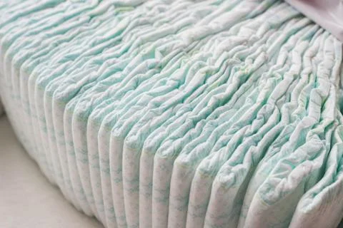 A large stack of baby diapers, close-ups, diaper packaging Stock Photos