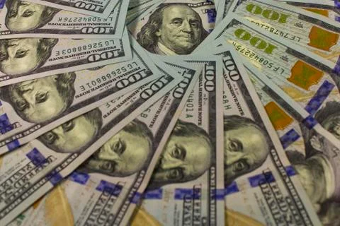 Large stack of banknotes of $ 100 in hand is close-up. 스톡 사진