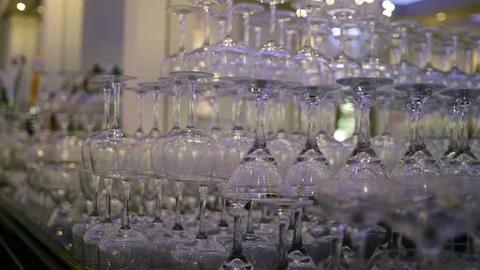 Large stack of different types of bar glasses on bar Stock Footage 112140479