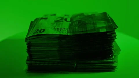 Large Stack Of Euro Notes Spins Under Green Light – Black Market Scene Europe Stock Footage 323045347