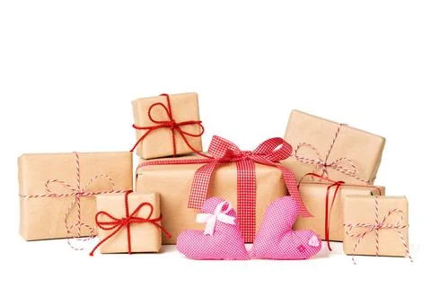  Large Stack of Gift box wrapped in recycled paper with ribbon bow, hearts... Stock Photos