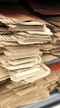 Large stack of paper craft shopping bags ready to use Stock Photos