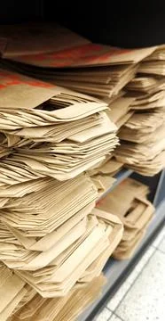 Large stack of paper craft shopping bags ready to use Stock Photos