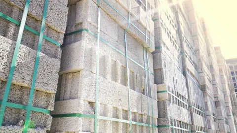 Large stack of pumice blocks and blocks packed on pallets in form of cube. Stock Footage 238814112