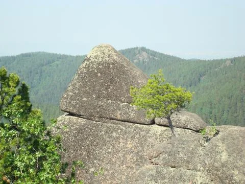 Large stone on a background of mountains 写真素材