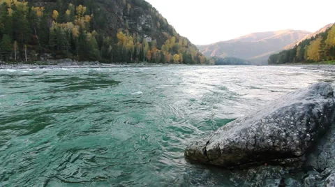 Large stone on the bank of a Katun river in Altay, Russia Stock Footage 30685732