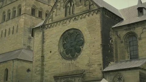 A large stone building with a large stained glass window Stock Footage 296400361