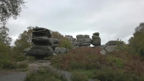 Large stone collections standing for tourists to explore at Brimham rocks Video stock 334271045