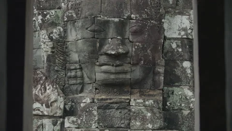 Large Stone Faces On The Towers At The Bayon Temple. Cambodia Vídeo Stock 134584555